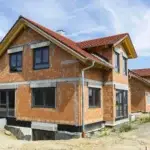 Neubau eines Einfamilienhauses im Rohbauzustand mit Ziegelmauerwerk in NRW